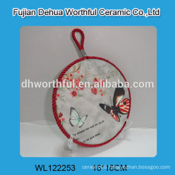 Modern design ceramic trivet with butterfly painting for wholesale